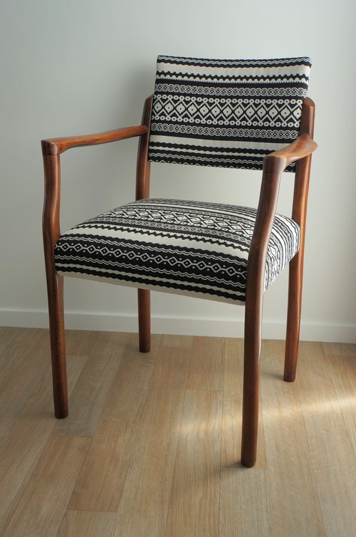 Upholstered black and white chair